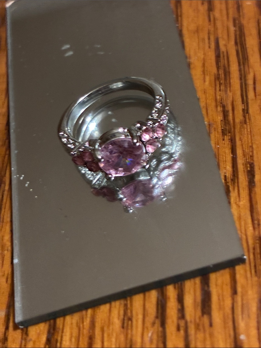 Silver Ring with Pink Center Stone and Accent Gems